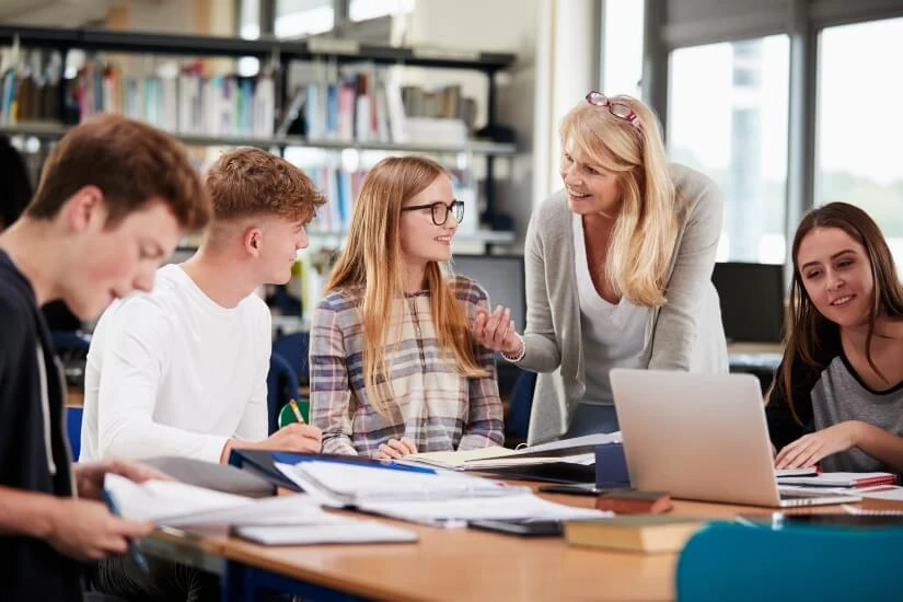 Teacher talking to children