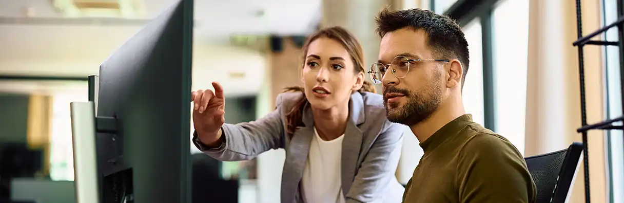 Office workers at a computer