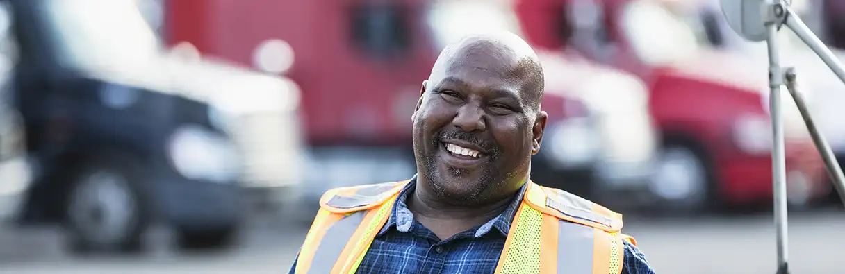 Man smiling in the street